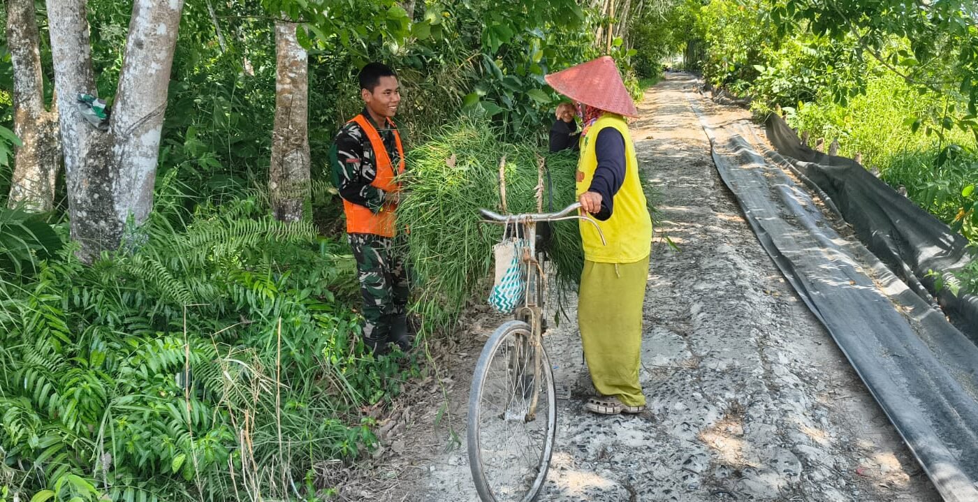 Kebersamaan dalam TMMD: Senyum Satgas Membawa Harapan di Desa Bandar Raya