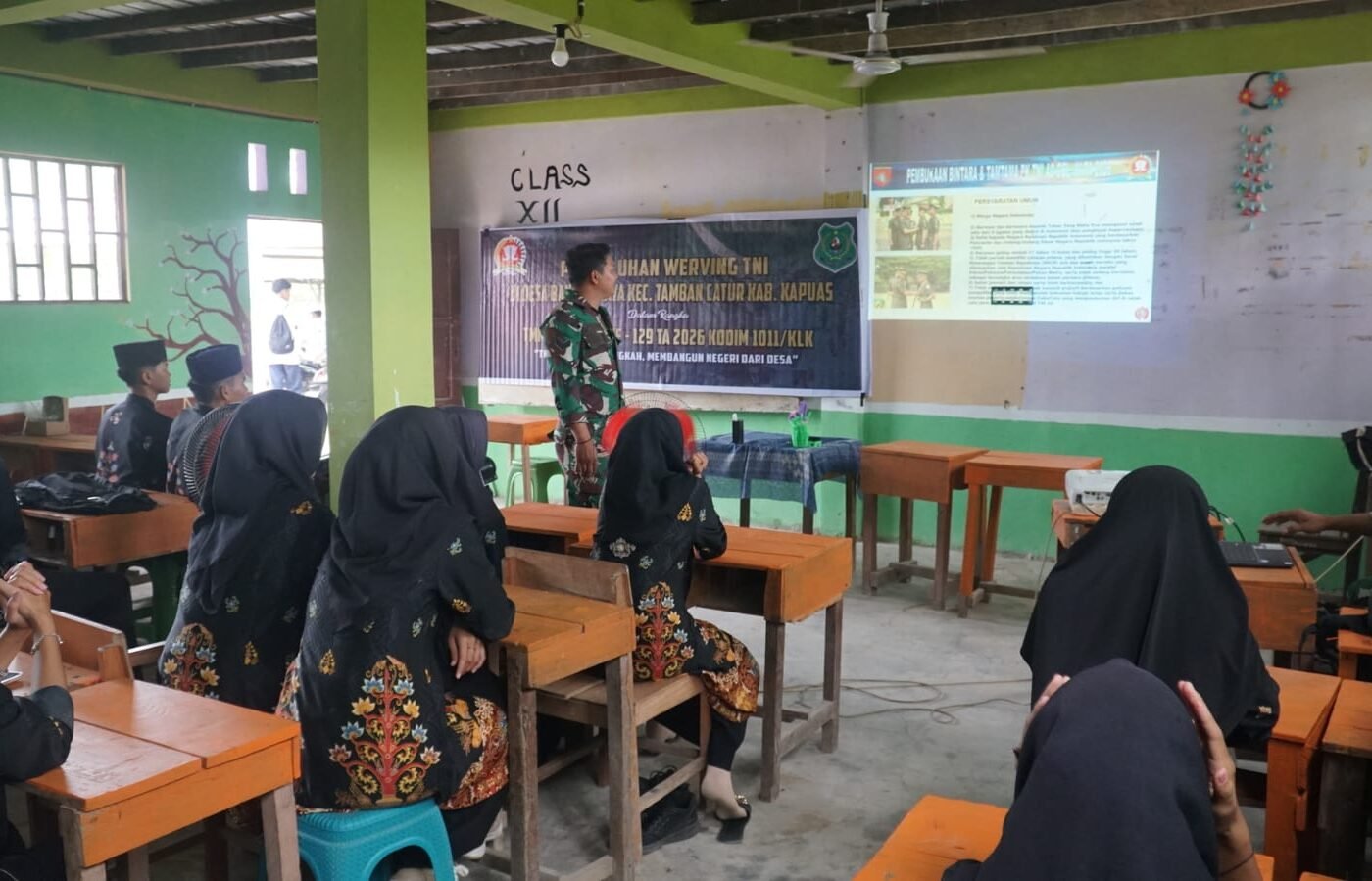 Penguatan Kesadaran Kebangsaan Melalui Penyuluhan Werving TNI di Desa Bandar Raya