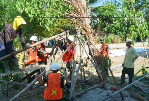 Kerjasama TNI dan Masyarakat Percepat Proyek Pengeboran di Desa Bandar Raya