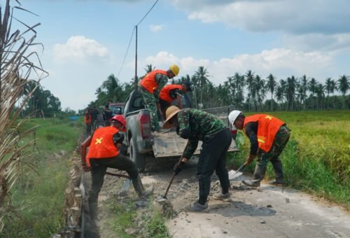 Kekuatan Gotong Royong dalam Pembangunan Jalan TMMD Ke-129