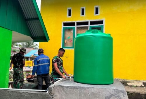 Pengecatan Tandon Air SDN Umbele Sebagai Langkah Akhir Program Air Bersih