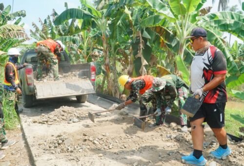 Sinergi Satgas TMMD dan Masyarakat dalam Pembangunan Jalan Desa Bandaraya
