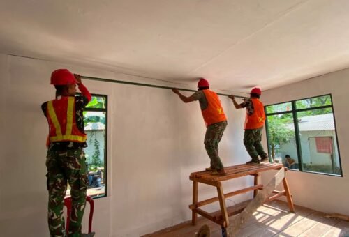 Sentuhan Akhir Renovasi RTLH TMMD di Desa Bandar Raya