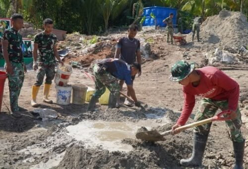 Peran Satgas TMMD dalam Memperbaiki Fasilitas Umum di Umbele