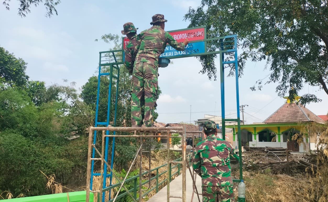 Jembatan Harapan di Brang Etan: Keceriaan Warga Kesongo Saat TMMD 129 Bojonegoro Lakukan Pembangunan