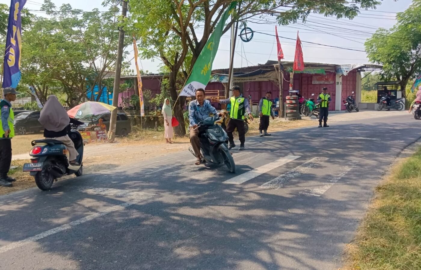 Peran Aktif Satlinmas dalam Keberlangsungan Bazar UMKM TMMD 129 Bojonegoro
