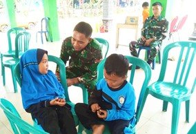 Kehangatan di Balik TMMD 129: Menggapai Senyum Anak Desa Kesongo