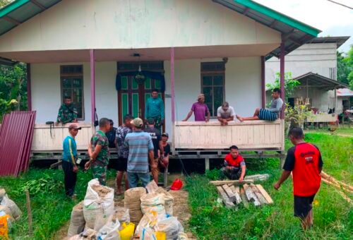 Kolaborasi TNI dan Warga dalam Pembangunan Fasilitas MCK di Dusun Belatung