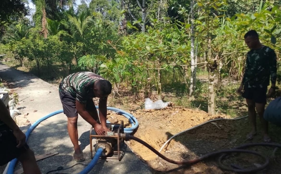 SUMUR BOR DESA ULAK PAUK AKHIRNYA MENGALIRKAN AIR BERKAT USAHA TIADA HENTI