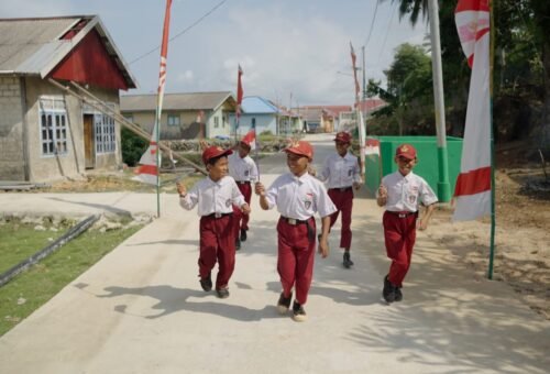 Keceriaan Anak Polewali dengan Jalan Baru Hasil Program TMMD