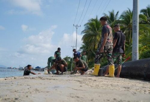 Satgas TMMD Lanjutkan Proyek Perbaikan Jalan di Umbele