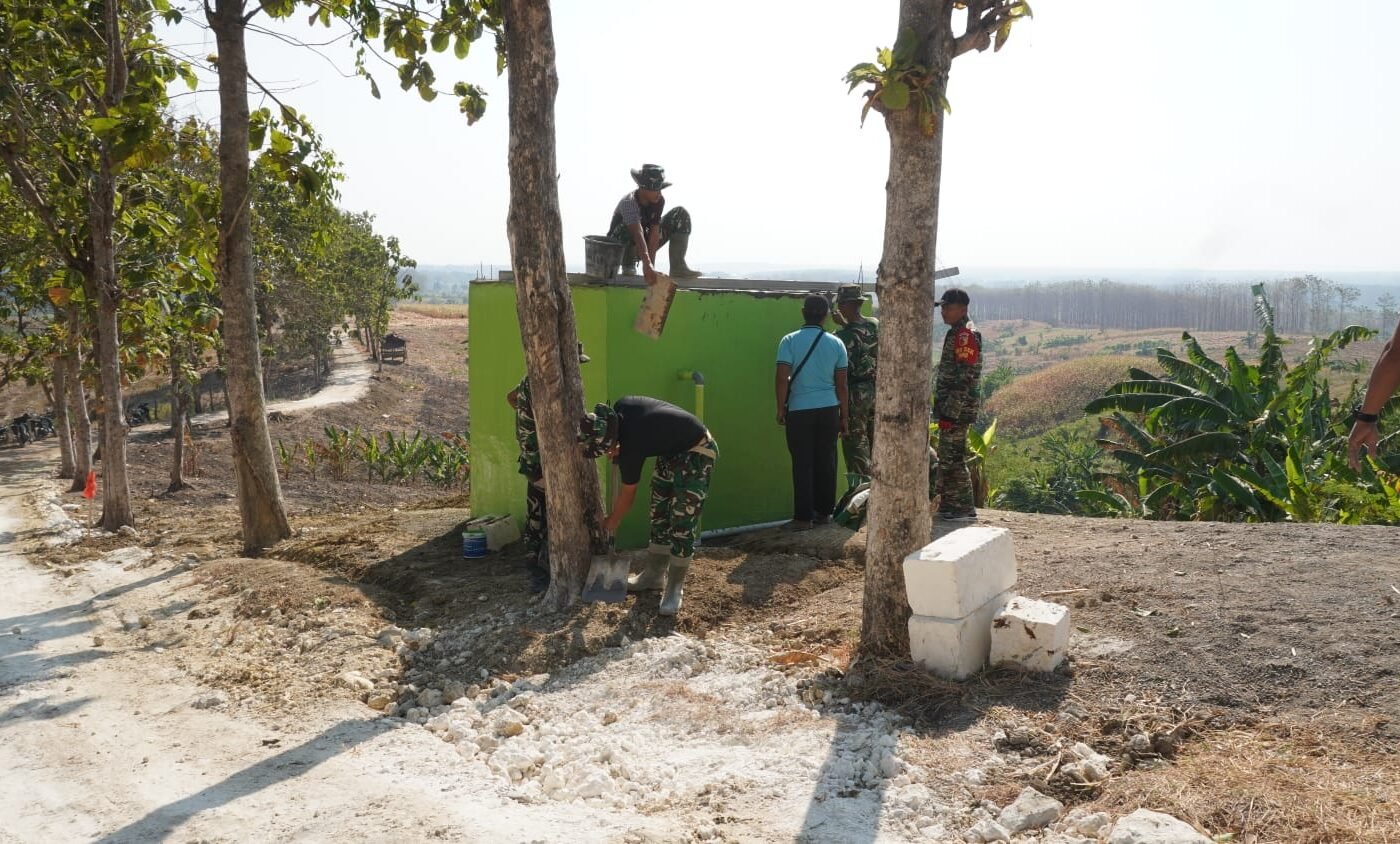 Progres Positif TMMD 129 Kodim 0812/Lamongan: Keramik yang Sempurna, Pengecoran Malam, dan Akses Air Bersih