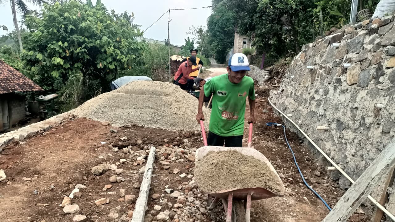 Transformasi Jalan Nangka, Satgas TMMD Gelar Pembangunan Rabat Beton