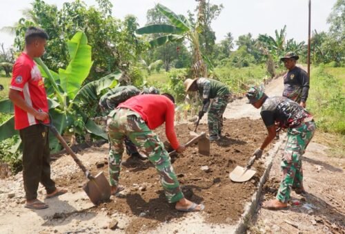 Keterlibatan Masyarakat dalam Proyek TMMD di Desa Bandar Raya