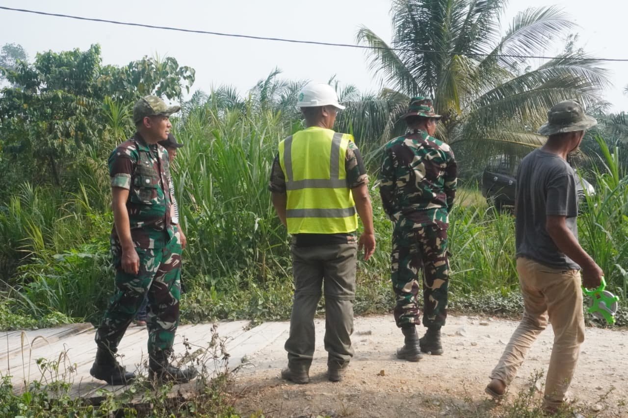 Perbaikan Jalan TMMD: Solusi Banjir bagi Warga Parumpanai